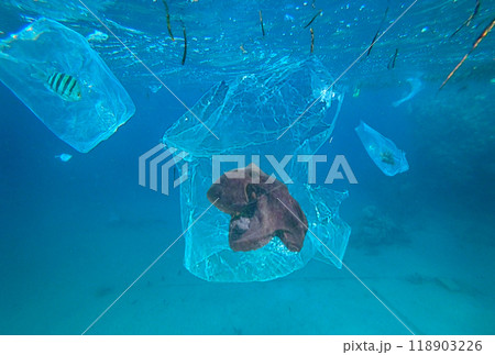 plastic trash floating in the sea plastic trash floating in the sea 118903226