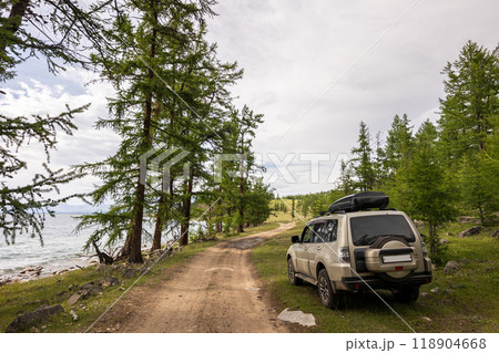 Japanese SUV on a road at the Khuvsgul lake in Mongolia. 118904668