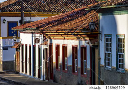 Old colorful houses with colonial style facades Old colorful houses with colonial style facades 118906509