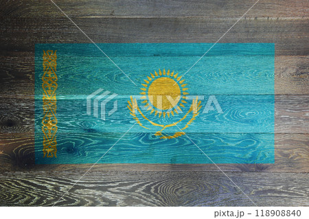 Kazakhstan flag on rustic old wood surface background Kazakhstan flag on rustic old wood surface background 118908840