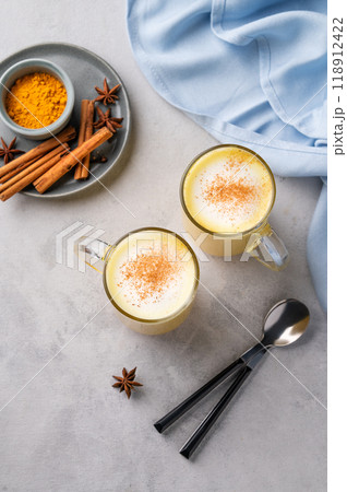 Turmeric golden milk latte with spices and honey. Detox, immunity boosting, anti-inflammatory drink 118912422