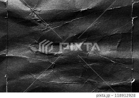 Black paper background with wrinkles, folds and crumpled distressed surface. Abstract grunge poster Black paper background with wrinkles, folds and crumpled distressed surface. Abstract grunge poster 118912928