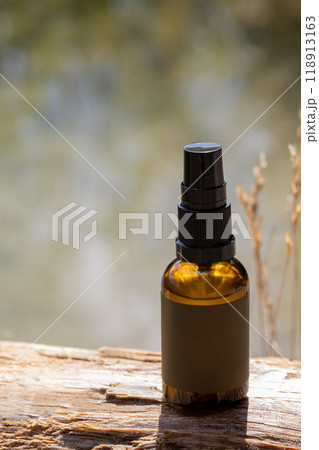 Spray Bottle on Rustic Wooden Surface 118913163