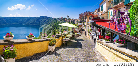 Most scenic lakes of Italy - volcanic Albano lake , charming floral streets of Castel Gandolfo village Most scenic lakes of Italy - volcanic Albano lake , charming floral streets of Castel Gandolfo village 118915188