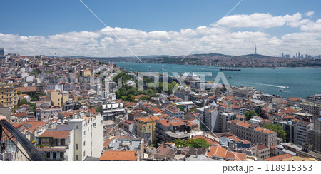 View from the roof of the Bosphorus Strait with ships and old town. Summer panoramic landscape View from the roof of the Bosphorus Strait with ships and old town. Summer panoramic landscape 118915353