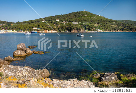 Beautiful panoramic view of the Black Sea with yachts, beach and islands in the background. Beautiful panoramic view of the Black Sea with yachts, beach and islands in the background. 118915633