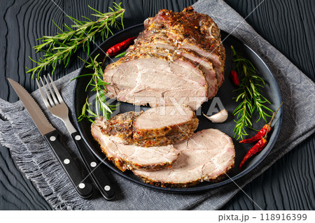 Roast Pork Neck sliced on a plate, top view Roast Pork Neck sliced on a plate, top view 118916399