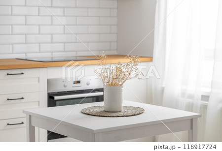 Wooden tabletop with dry bouquet for product montage or mockup 118917724