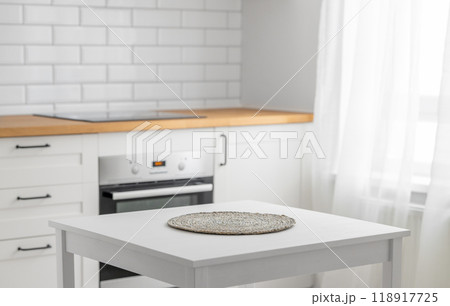 Wooden tabletop with napkin for product montage or mockup 118917725