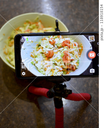photo or video shooting of a salad with fresh vegetables 118918154