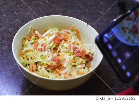 photo or video shooting of a salad with fresh vegetables 118918155