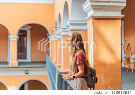 Female tourist in the Biblioteca Palafoxiana, Palafoxiana Library, Puebla, Mexico. Cultural exploration, history, and travel experience concept 118918634