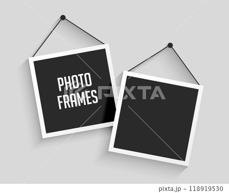 two blank hanging photo frames background 118919530