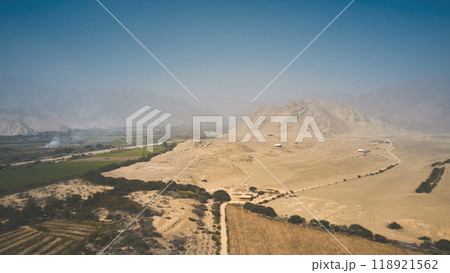 Panoramic view the ancient archaeological site of Caral, near Supe, Barranca Province, Peru. Caral is a UNESCO world heritage site and considered to be the oldest city in the Americas. 118921562