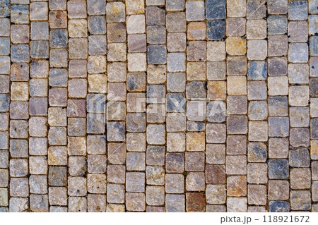 Beautiful and intricate cobblestone street pavement mosaic pattern texture for urban design 118921672