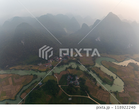 Aerial wide angle view of landscape with rice field at Phong Nam village in Trung Khanh, Cao Bang province,Northern Vietnam Aerial wide angle view of landscape with rice field at Phong Nam village in Trung Khanh, Cao Bang province,Northern Vietnam 118922240