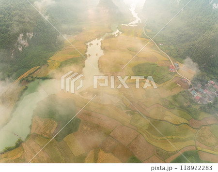 Aerial wide angle view of landscape with rice field at Phong Nam village in Trung Khanh, Cao Bang province,Northern Vietnam Aerial wide angle view of landscape with rice field at Phong Nam village in Trung Khanh, Cao Bang province,Northern Vietnam 118922283