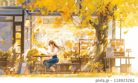 秋のカフェテラスで読書する女性｜黄葉に包まれた静かなひととき 118923262
