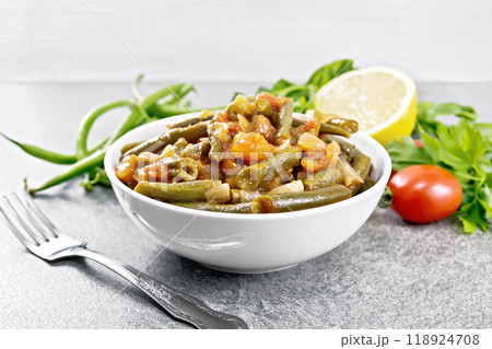 Beans green with vegetables in bowl on granite table Beans green with vegetables in bowl on granite table 118924708