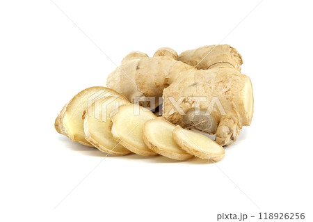 Fresh ginger root with slices isolated against a white background 118926256