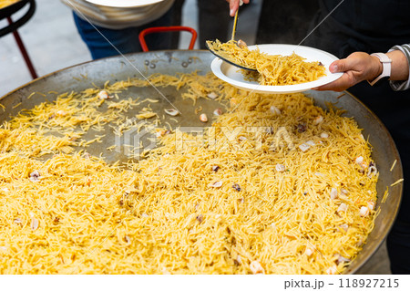 Fideua seafood portions served at street party Fideua seafood portions served at street party 118927215