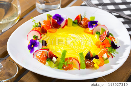 Raw salmon tartare with fruits, vegetables, flowers Raw salmon tartare with fruits, vegetables, flowers 118927319