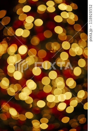 A blurry Christmas tree with lights and ornaments A blurry Christmas tree with lights and ornaments 118928552