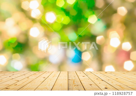 Empty wood table top with blur Christmas tree with bokeh light background 118928757