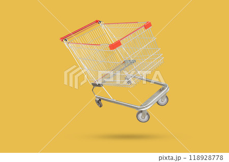 shopping cart isolated on yellow background 118928778