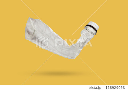 recycled plastic bottle isolated on yellow background 118929068