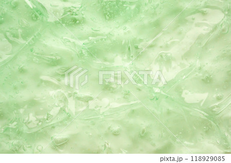 Transparent clear green liquid serum gel cosmetic texture background 118929085