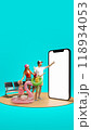 Family dressed for vacation, pointing at giant 3D model of phone with blank screen, representing online travel booking, online payment, services. Summer vibe. 118934053