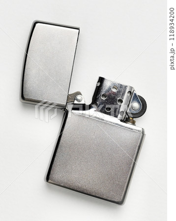 Windproof Oil lighter on the isolated white background, popular and  fashionable vintage look lighter 118934200