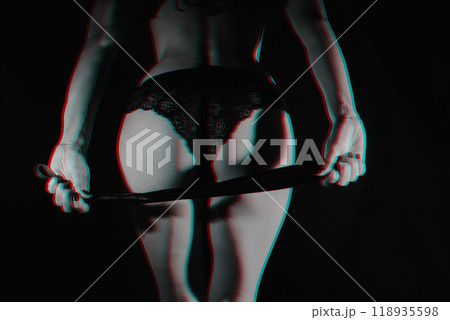 girl dominatrix dominatrix holds a leather whip Flogger in her hand for whipping and punishment in BDSM sex girl dominatrix dominatrix holds a leather whip Flogger in her hand for whipping and punishment in BDSM sex 118935598