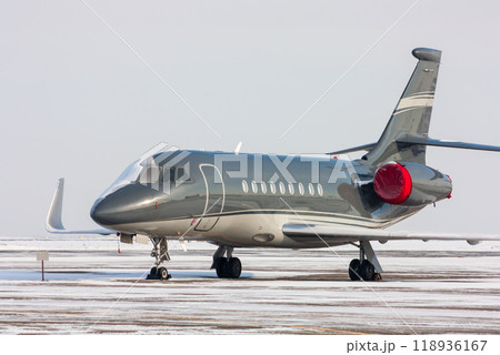Encased private jet in a cold winter airport 118936167