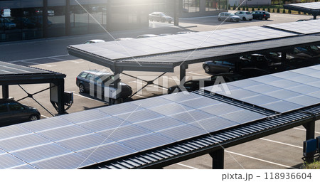 Parking space with solar panels on a roof 118936604