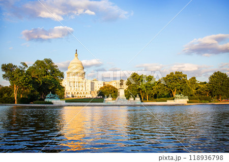 The United States Capitol building reflected on the reflection pool on a sunny day at nation mall, Washington DC, USA. 118936798