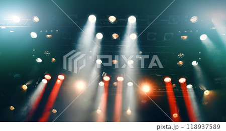 glowing ceiling spotlights lights the stage 118937589