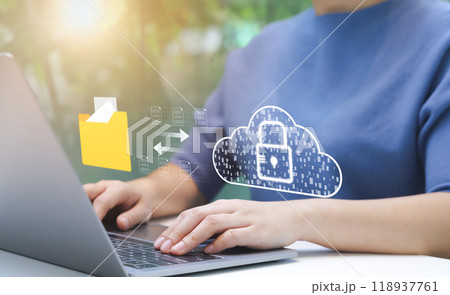 Person Managing Secure Cloud Data Transfer. An individual uses laptop to manage secure data transfer to cloud, virtual lock, representing robust cybersecurity measures. File storage, Manage folders, Person Managing Secure Cloud Data Transfer. An individual uses laptop to manage secure data transfer to cloud, virtual lock, representing robust cybersecurity measures. File storage, Manage folders, 118937761
