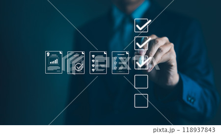 Quality Assurance and Document Control with Checklist Icons. Businessman mark off items on digital checklist, representing quality assurance and document control processes, verification and compliance 118937843
