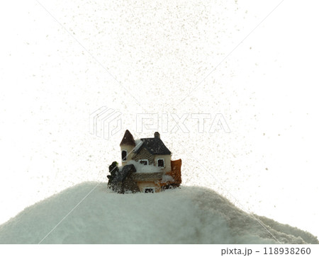 Snow fall cover house over white background isolated. Winter snow storm falling on house like avalanche from climate change extreme weather disaster Snow fall cover house over white background isolated. Winter snow storm falling on house like avalanche from climate change extreme weather disaster 118938260