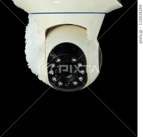 Surveillance CCTV as security camera to record and monitor outdoors of house got snow falling. Snow falling on Surveillance CCTV security camera over night black background isolated Surveillance CCTV as security camera to record and monitor outdoors of house got snow falling. Snow falling on Surveillance CCTV security camera over night black background isolated 118938269