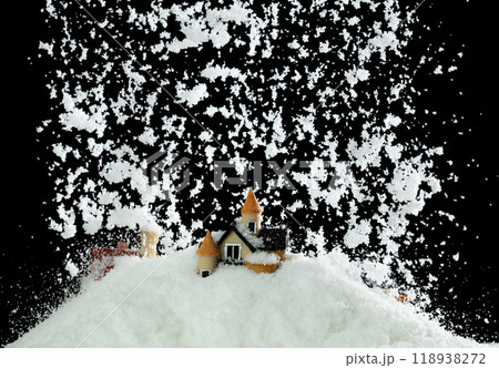 Snow fall cover house over black night background isolated. Winter snow storm falling on house like avalanche from climate change extreme weather disaster Snow fall cover house over black night background isolated. Winter snow storm falling on house like avalanche from climate change extreme weather disaster 118938272