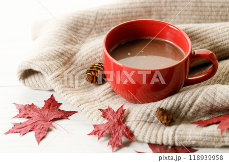 Hot chocolate drink in a red cup. Autumn Winter composition 118939958