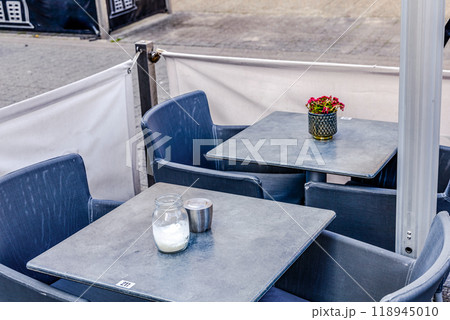 Summer restaurant on the city street. Outdoor cafe. Summer restaurant on the city street. Outdoor cafe. 118945010