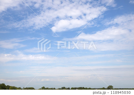 View of beautiful blue sky with white clouds. View of beautiful blue sky with white clouds. 118945030