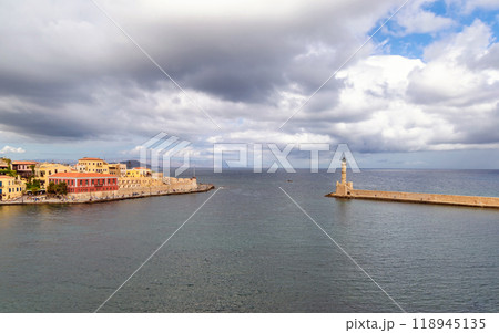 Landmarks of Crete - Panorama View of venetian port of Chania and lighthouse in old harbour of Chania, Greece. 118945135