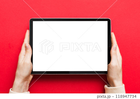female teen hands using tablet pc with white screen, Mockup image of woman hand holding white tablet pc with blank white screen at home female teen hands using tablet pc with white screen, Mockup image of woman hand holding white tablet pc with blank white screen at home 118947734