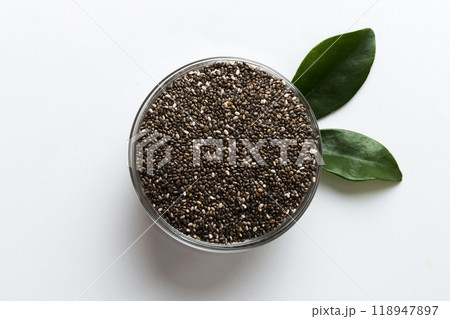 Chia seeds in bowl on colored background. Healthy Salvia hispanica in small bowl. Healthy superfood 118947897