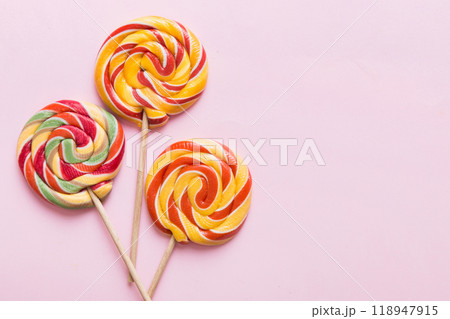 Set of colorful lollipops on colored background. Summer concept. Party Happy Birthday or Minimalist Concept 118947915